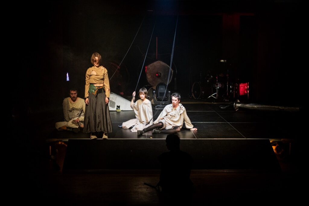 Golden light stage image with body and object